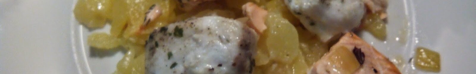 Dados de salmón y merluza en papillote